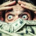 a man looking to be stressed by his financial situation